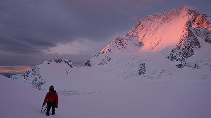 Graeme adiring the sunrise from knee deep snow