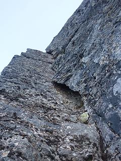 Looking up the 5.8+ money pitch just below the bivy ledge