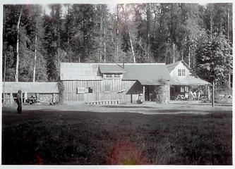 Smith Place - Queets Valley - ca. 1929 - view looking east - L to R woodshed, bunkhouse, original Shaube structure, Smith addition - photo courtesy L. Vaughan