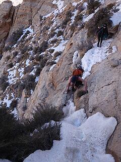 Navigating the icy narrow ledge