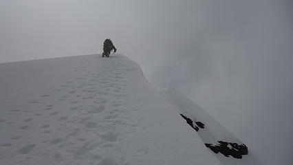 Downclimbing the ridge
