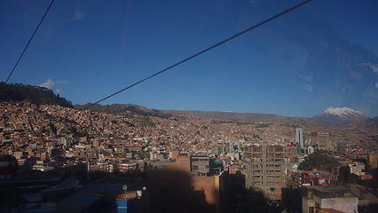 Riding the $0.50 gondola up the hill above La Paz